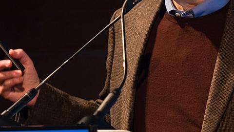 Dr. Donald Ingber speaking at a podium